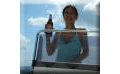 girl on boat with beer